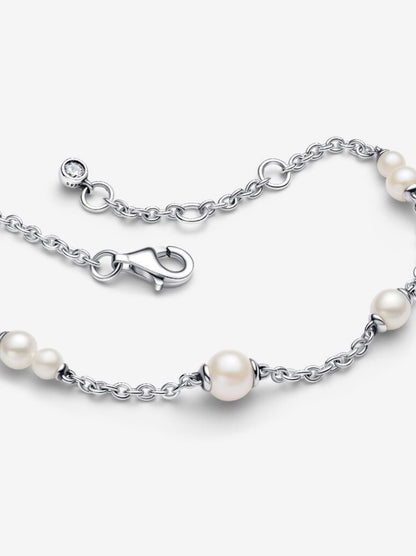 Brazalete con perlas blancas